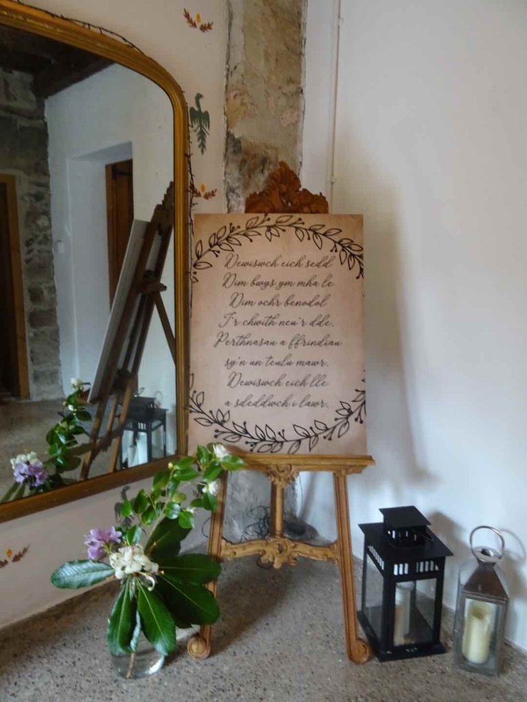 Easel in front of the great mirror in the Big barn foyer
