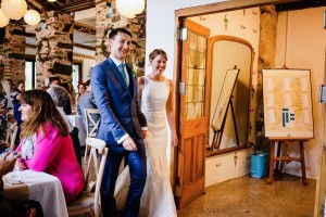Cris Lowis photo of wedding couple at foyer entrance to Llyn Gwynant Big barn